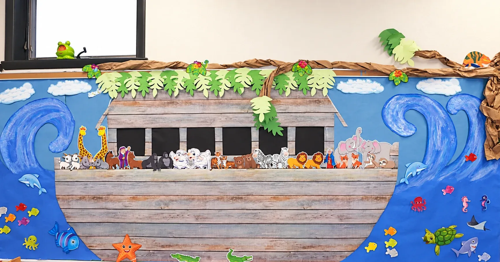 The hand-crafted Noah's Ark mural in the preschool classroom