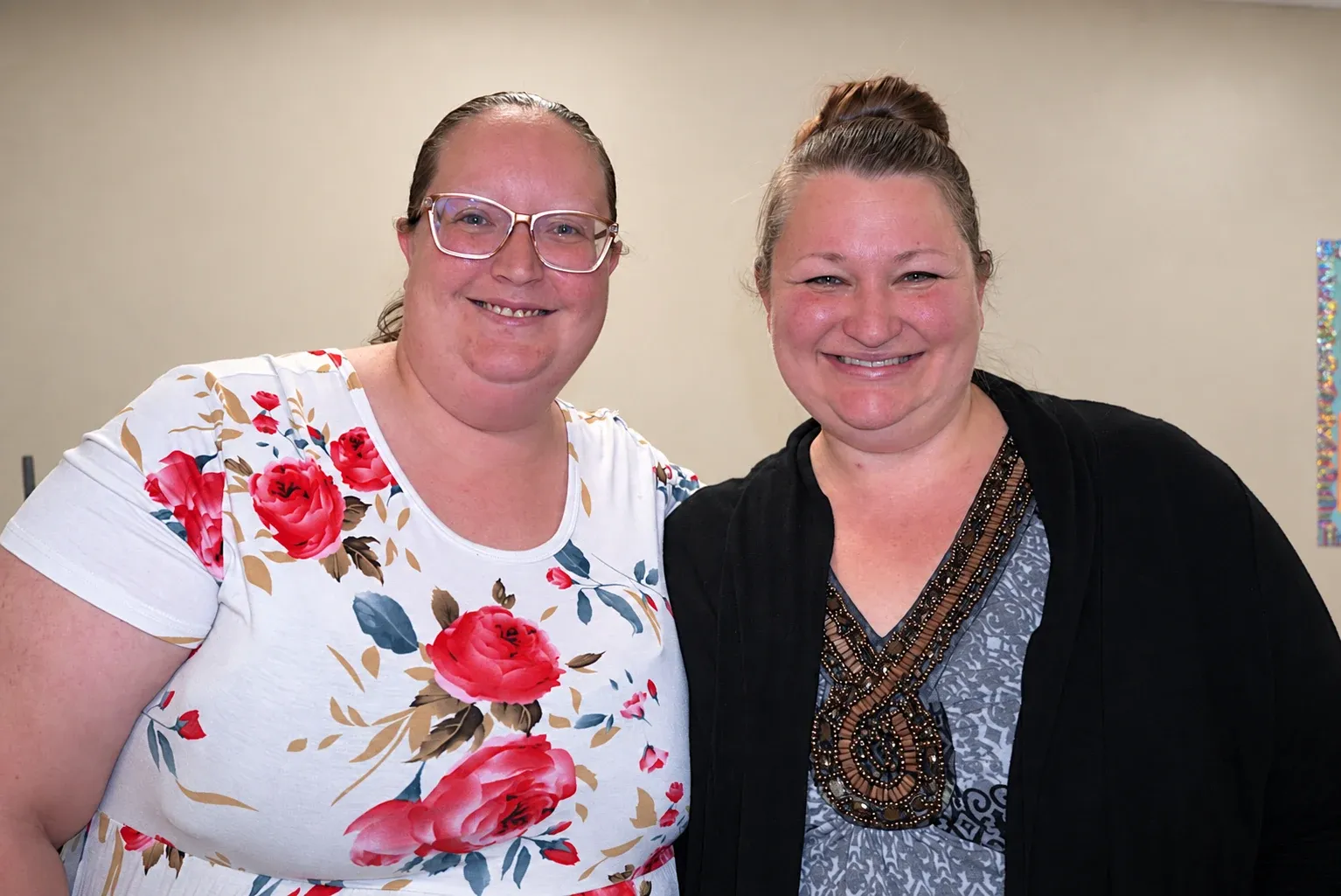 Two Chapel Glen ELA staff members smiling together