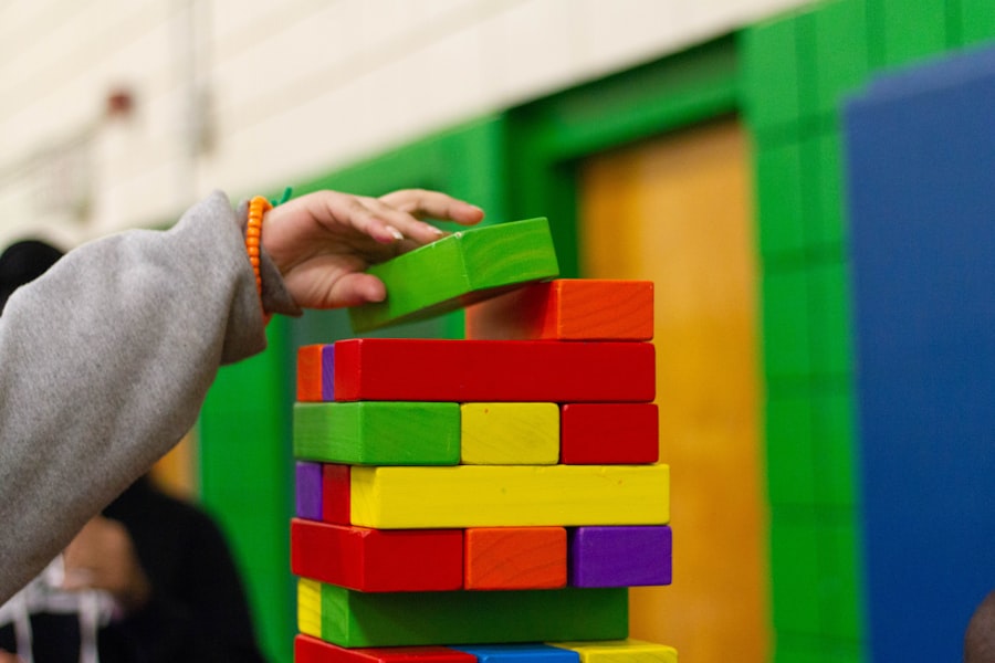A child stacking building blocks